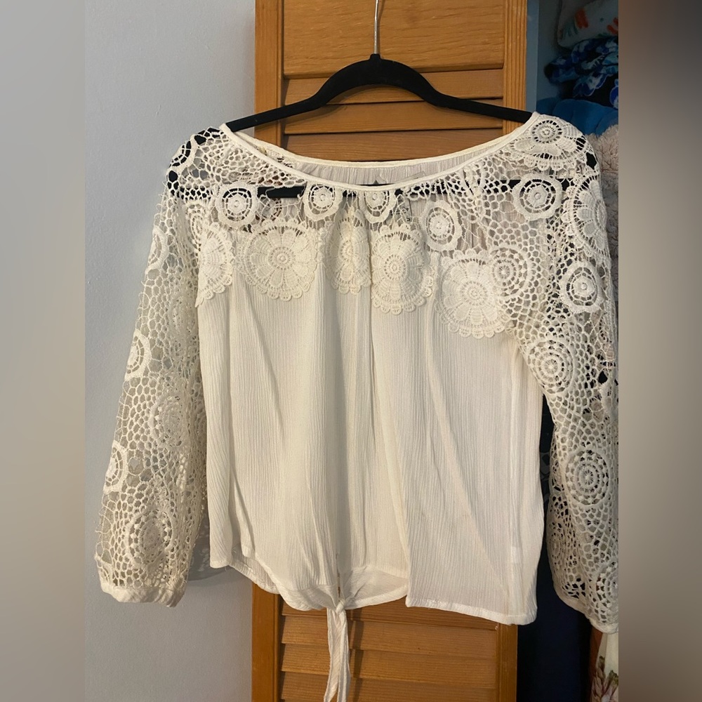 White sleeve cut out shirt